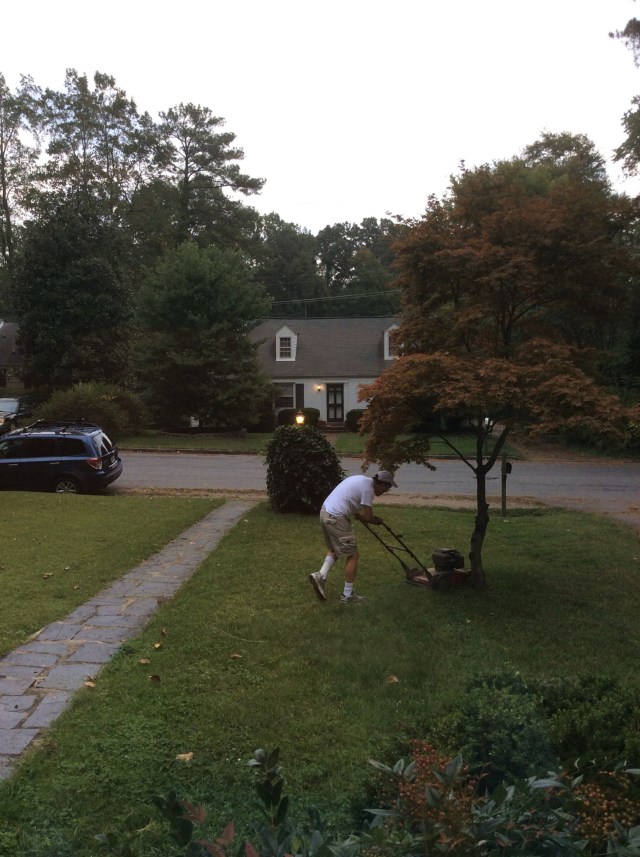 Whistling and singing Paul Simon and enjoying the smell of freshly mown grass