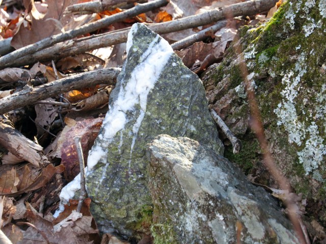 Granite with a streak of quartz. 