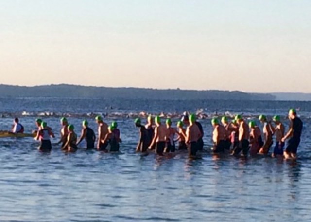 As a friend mentioned, you can recognize me because I'm the one in the green cap. 